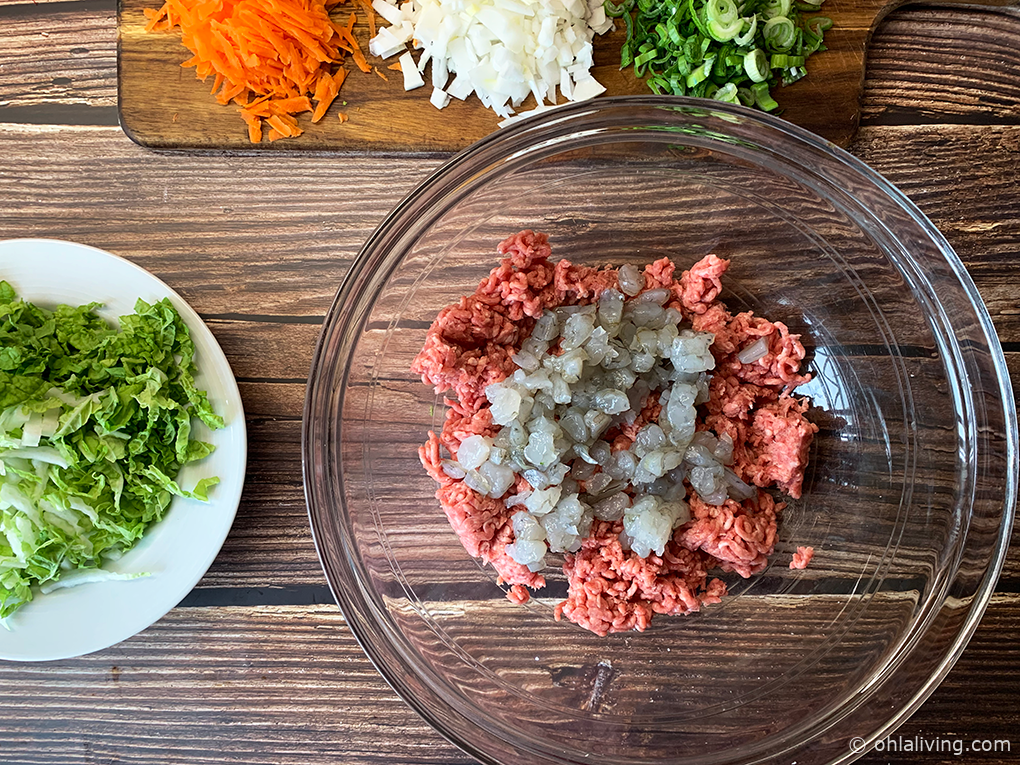 Add chopped prawns into the pork